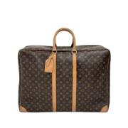 Louis Vuitton Vintage Pre-owned Belagd canvas resvskor Brown, Dam