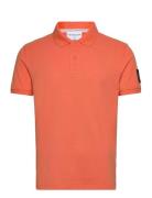 Badge Polo Tops Polos Short-sleeved Orange Calvin Klein Jeans
