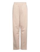 The New Tnniko Uni Melange Sweatpants Beige