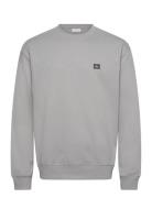 Calvin Klein Jeans Ls 350Terry Eu Whsl Badge Crewne Grå